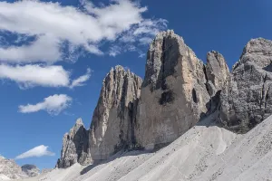 Three Peaks rock formation in front of a blue sky