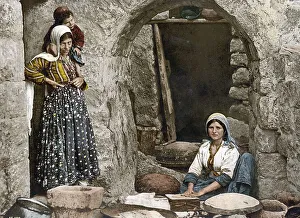 Peasant woman baking bread, Syria