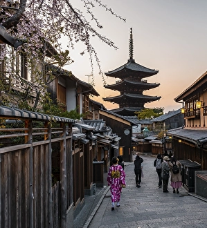 Pedestrian with kimono, Yasaka dori historical street in the Old Town with traditional Japanese houses