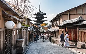 Pedestrian with kimono, Yasaka dori historical street in the Old Town with traditional Japanese houses