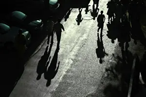 Pedestrians walking on p.m. road fort
