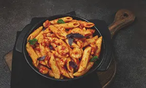 Penne pasta, with shrimp in tomato sauce