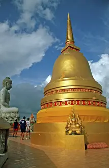 People, Buddha statue, chedi in Wat Tam Sua monastery