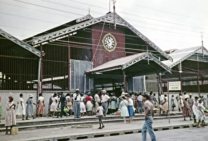 People crowd outside market building Castries, St Lucia, West Indies 1962