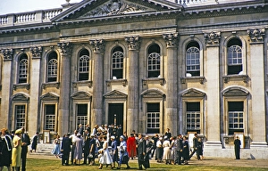 People mingle in front of the Senate building, University of Cambridge, Cambridge, England, UK June 1957
