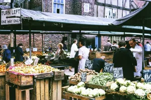 People shopping at the busy street vegetable market near the Shambles, York, Yorkshire, England, 1963
