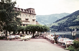People sitting at tables on the terrace of the Seecafe, Grand Hotel, Zell am See, Austria, Europe 1960, Europe