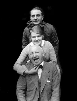 Three people smiling and laughing
