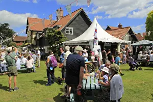 People at summer village fete, Thorpeness