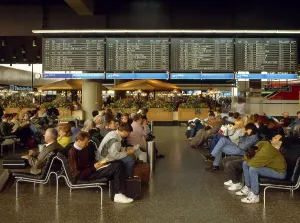People waiting at the airport check-in hall Frankfurt am Main
