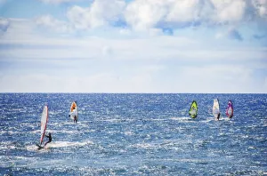 People windsurfing on Hookipa Beach