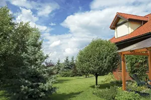 Perfectly manicured home with garden