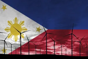 Philippines flag wind farm at sunset