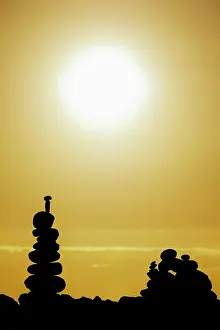 Photo Picture Stack of stones on the sea beach