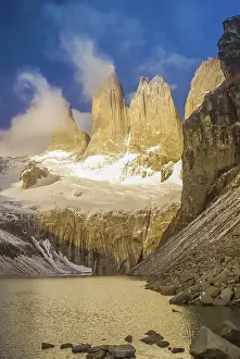 Category Mountain Landscapes Prints: Photo of river and rocks covered in snow in Parque Nacional Torres del Paine in Chile