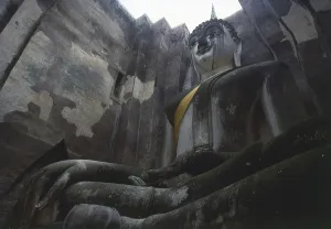 The Phra Atchana Buddha at Wat Si Chum is in the posture of Subduing Mara or Calling the Earth to