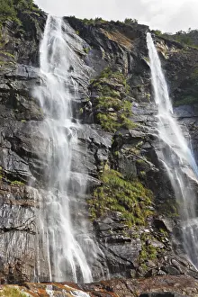 Picturesque double waterfall in the mountains of Northern Italy