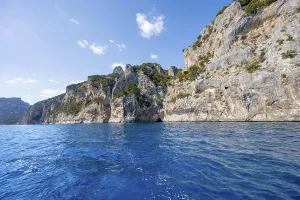 Picturesque rocky coast, cliffs and blue sea