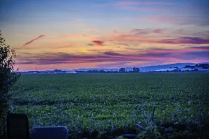 A picturesque sunset paints the sky in vivid colours