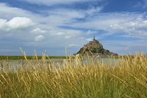 Picturesque view of Mont Saint-Michel on an island with medieval architecture