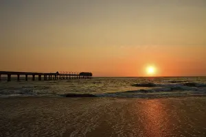 Pier at sunset over the Atlantic