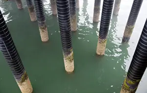 Pier support column pillars rise from sea at the seaside town of Cromer