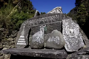 Piled up Mani stones, sacred stone tablets