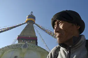 Pilgrim in front of Boudnath Stupa
