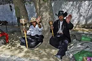 Pilgrims with prayer wheels, Shigatse near Lhasa