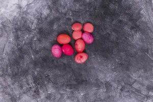 Pink easter eggs with macaroons table