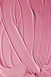 Pink lipstick or lip gloss texture as cosmetic background
