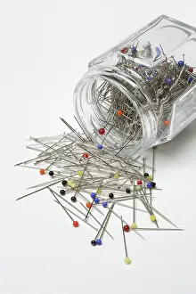 Pins in glass jar, Germany, Europe