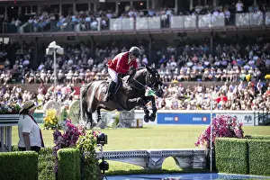 Category Historic EN Prints: Pius Schwizer of Switzerland and riding Vancouver De Lanlore compete in the first round of the 1