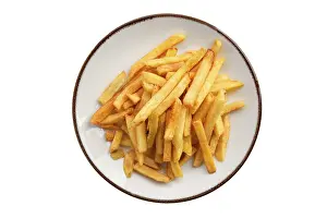 Plate with french fries isolated on white background