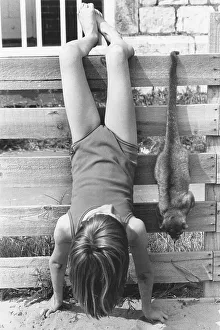 Playing girls and animals, England, Great Britain