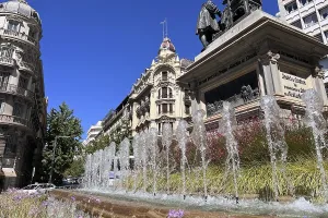 Plaza Isabel Catolica with fountain and historic monument
