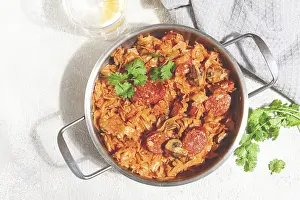 Polish dish bigos, in a stainless steel pan