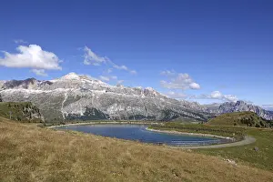 Pond on the Padonkamm with a view of the Sella