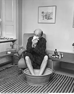 A Poorly Chap with His Feet in a Hot Bath 1950