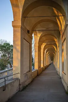Portico at sunset, arcades to Colle della Guardia