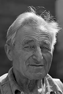 Portrait of an elderly farmer with white hair