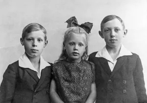 Portrait, three siblings looking into the camera