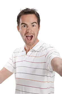 Portrait of young surprised man gesturing