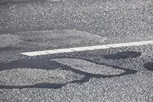 Pothole in the road surface, Germany