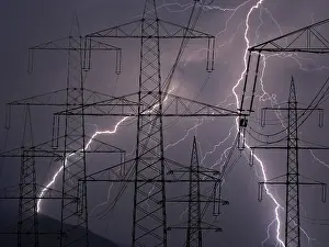 Power pylons in a thunderstorm