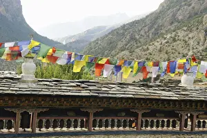 Prayer wheel and holy flag in upper pisang