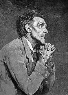 Praying man holding a rosary, historical woodcut