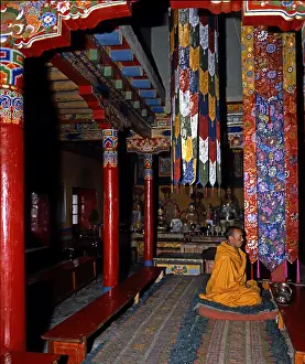 Praying monk in Lamayuru Monastery