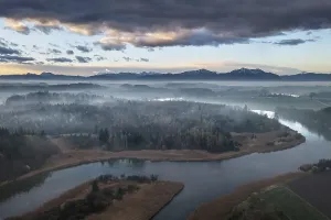 Pre-Alpine landscape with ground fog at dawn