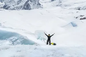 Preparation of a mountain guide on ice axes and riding skills on a glacier in the North Caucasus